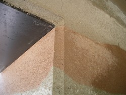 The decorative rammed earth wall that the author discusses.