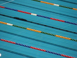 Photo of an Olympic size swimming pool by dtcreations/morguefile.com.
