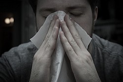 Photo of a man with allergies by William Brawley/Flickr Creative Commons.