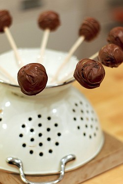 Photo of cake pops drying in a colander by Claire Sutton/Flickr Creative Commons.