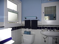 This is a lovely, simple finished bathroom remodel. We like the shade of this blue bathroom. (Photo: lavenderstreak/Flickr)