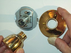 Philip Schmidt (the author) is pictured here fixing a doorknob.