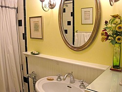 This photo shows my bathroom, with the Wood element represented in the beautiful silk flower arrangement on the right.