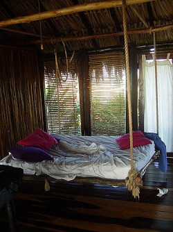 A tropical hanging bed via Selkie30 in Flickr.