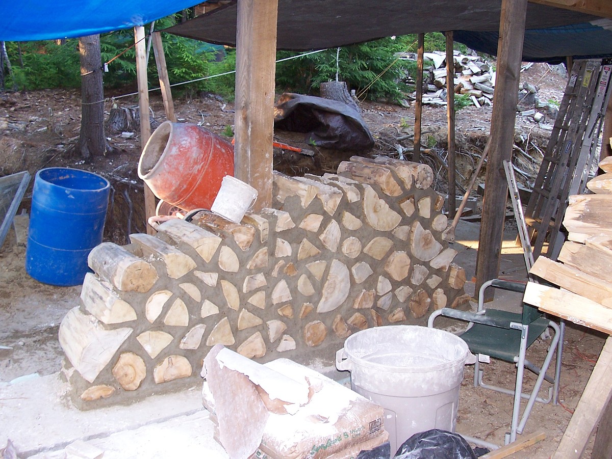 Cordwood masonry in progress.  Photo: Todd Muller.