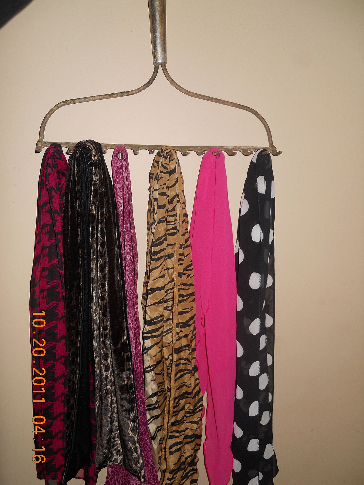 Rake head scarf rack by Lee Anne Culpepper. Rake head scarf rack by Lee Anne Culpepper.