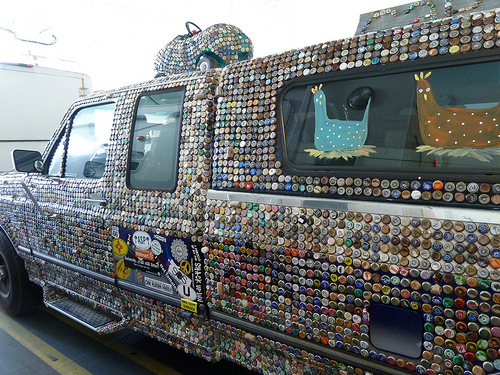 Photo of bottle cap covered art truck by wlcutler/Flickr. Photo of bottle cap covered art truck by wlcutler/Flickr.