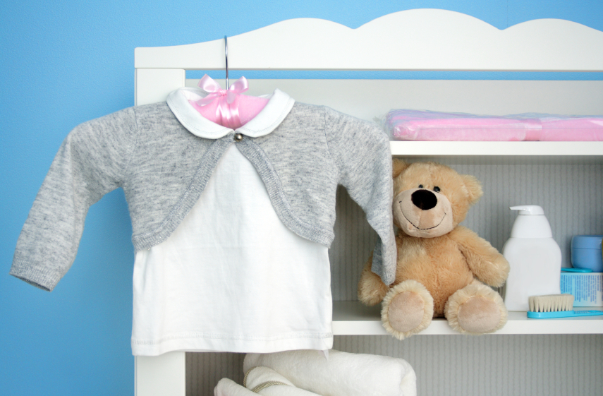 Photo of baby clothes by Kasiam/istockphoto.com. Photo of baby clothes by Kasiam/istockphoto.com.
