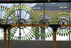 Beer bottle clocks by Stanley Clockworks stand on display at the Philadelphia International Airport. (Photo: waitscm/Flickr)