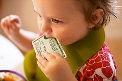 Photo of cute baby and credit card by _Dinkel_/Flickr.
