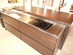 Tiger wood island with hidden cook top by j.t. Dufour Design LLC via Jamie D./Hometalk.com.