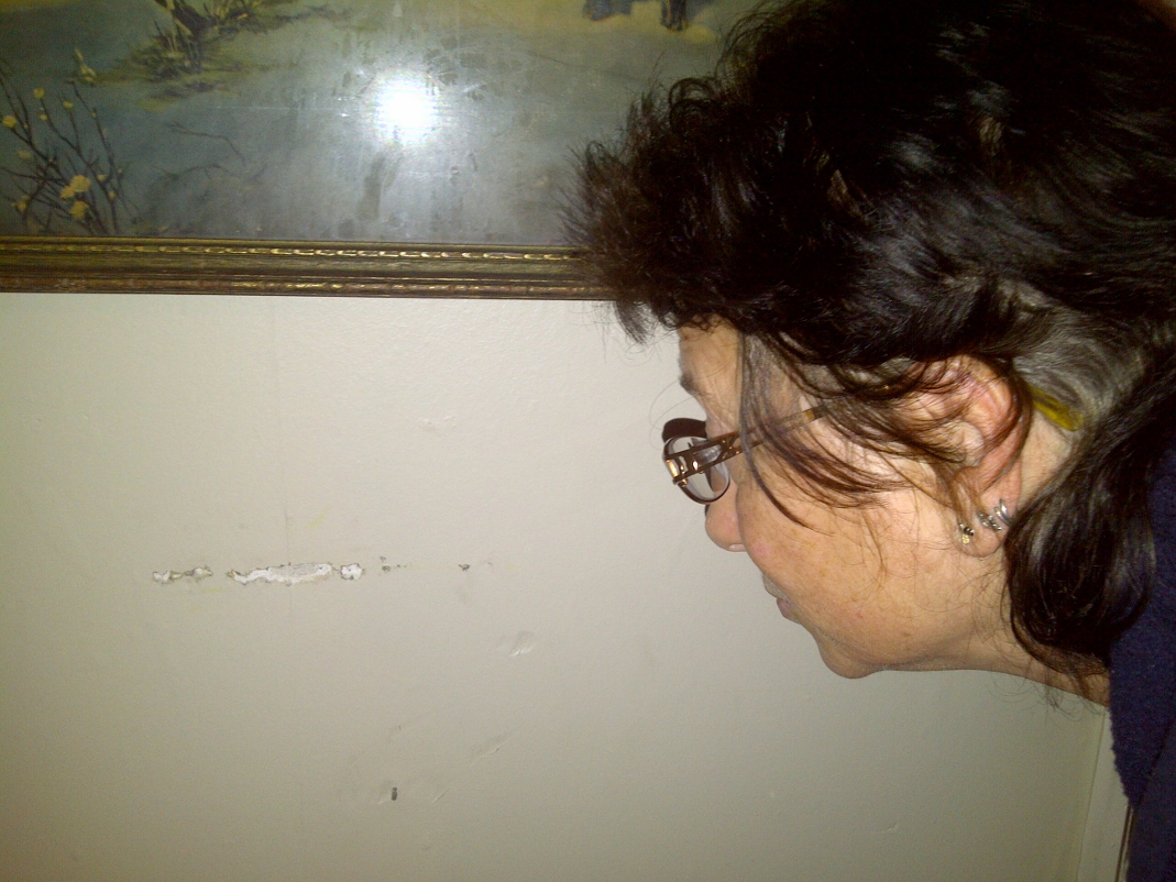 Am I obsessed with fixing this gouged bit of wall? No, because I have friends and a life.