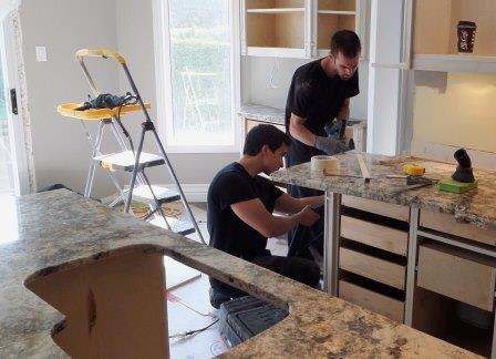 Granite countertop installation Tino Rossini / flickr Granite countertop installation Tino Rossini / flickr
