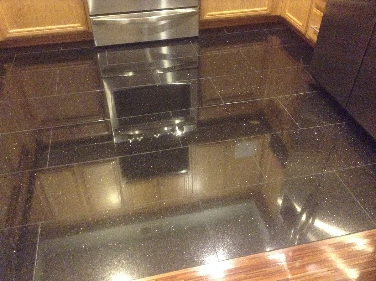 My son likes to see his reflection in the floor tile My son likes to see his reflection in the floor tile