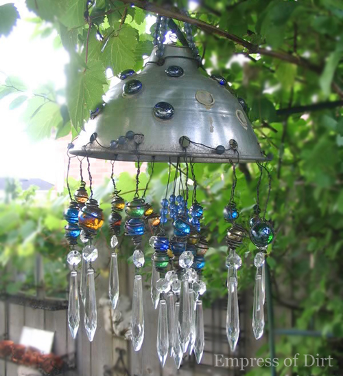Colander wind chime and ohoto by Melissa @Empress of Dirt via Hometalk.com.