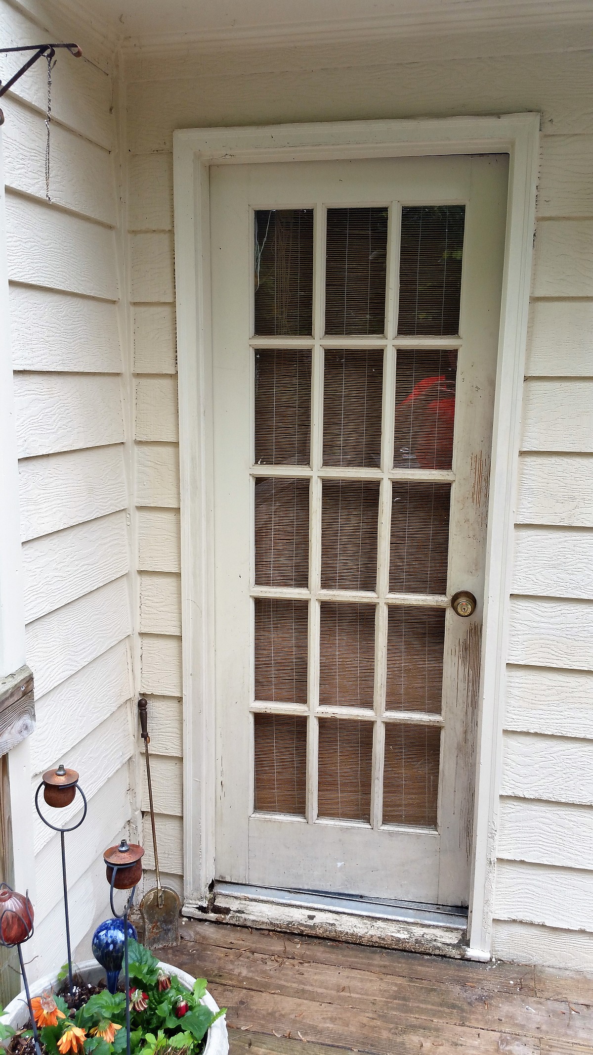 Before: old rotten, warped wood door Before: old rotten, warped wood door