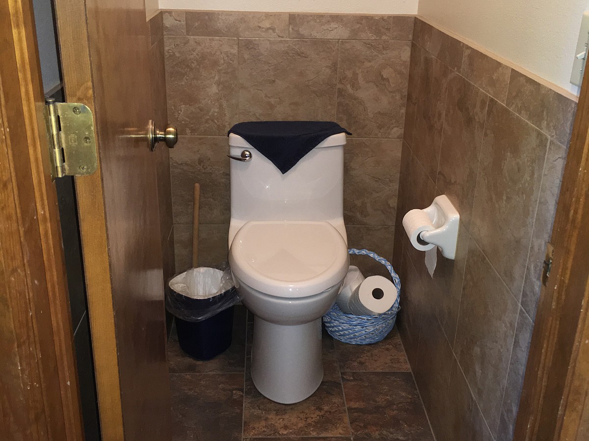 Tile wainscot in the commode room Tile wainscot in the commode room