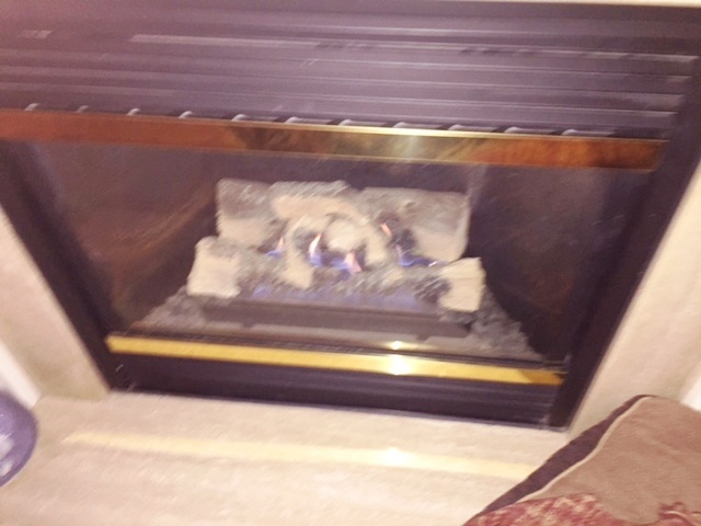 BEFORE Gas fireplace was in bad shape BEFORE Gas fireplace was in bad shape