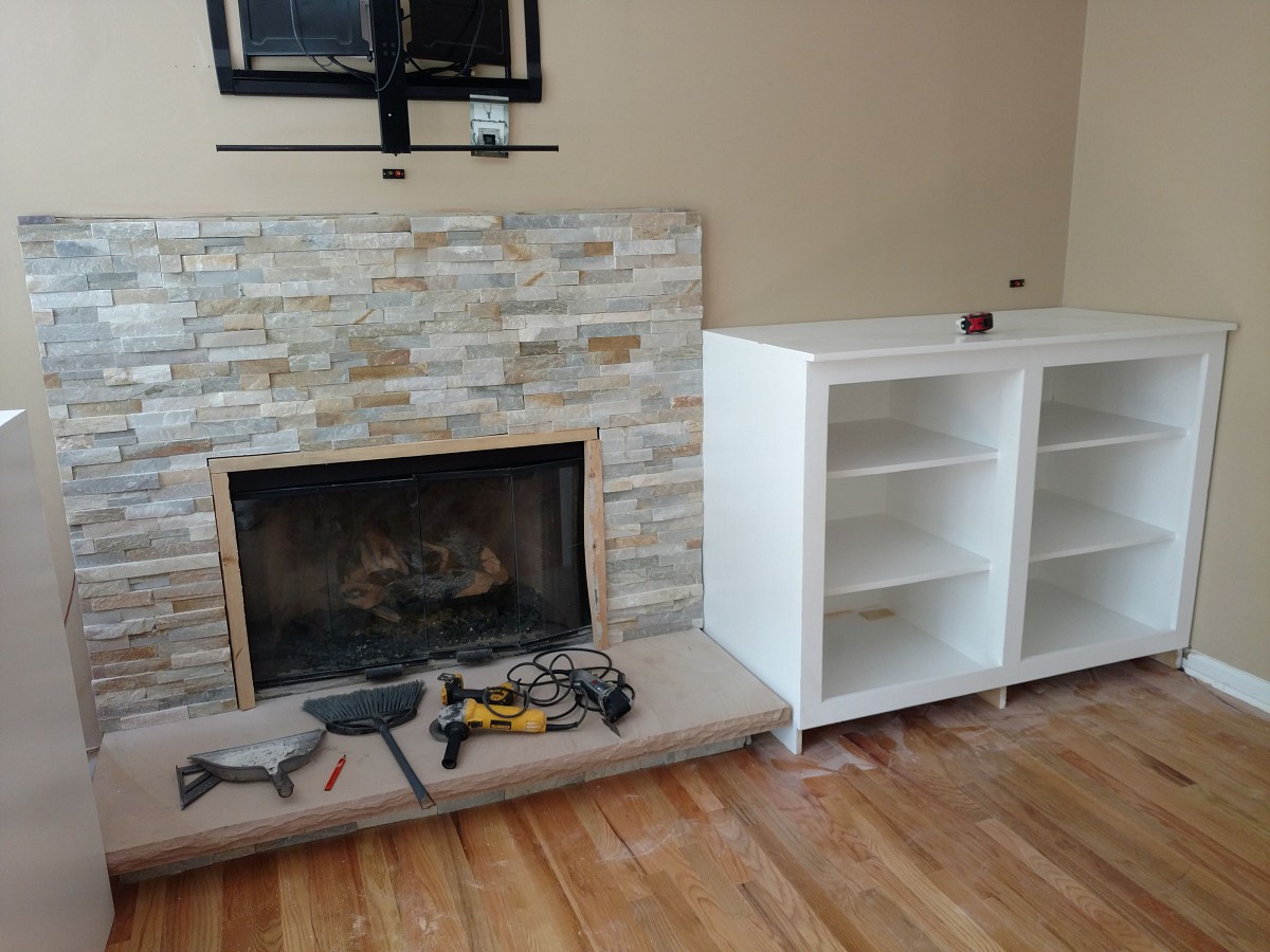 Finished fireplace with damage to hardwood floor Finished fireplace with damage to hardwood floor